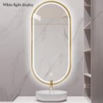 Espejo de baño LED ovalado con 3 luces regulables, iluminación delantera y trasera, espejo de pared inteligente, marco de aleación de aluminio (color: dorado, tamaño: 19.7 x 27.6 in)